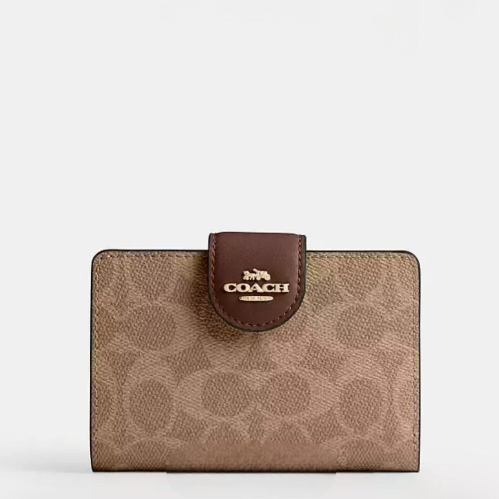 LIKE NEW  USED Coach Medium Corner Zip Wallet In Signature Canvas